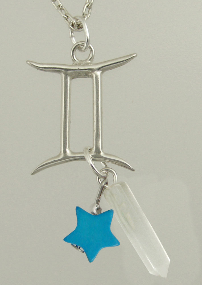 Sterling Silver Gemini Pendant Necklace With an Clear Crystal And a Turquoise Star